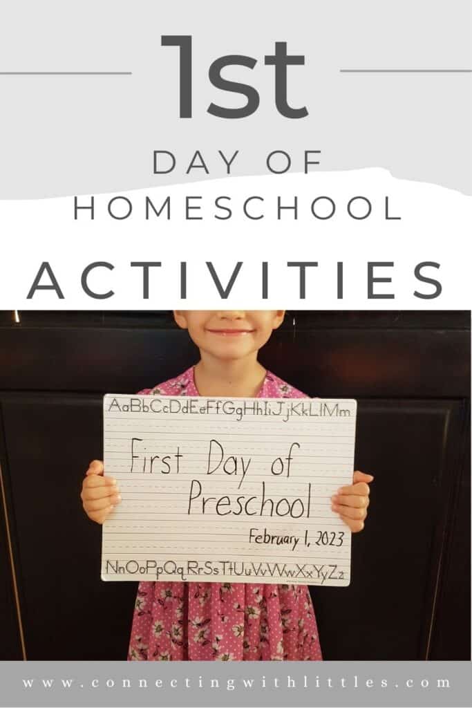 little girl holding first day of preschool sign
