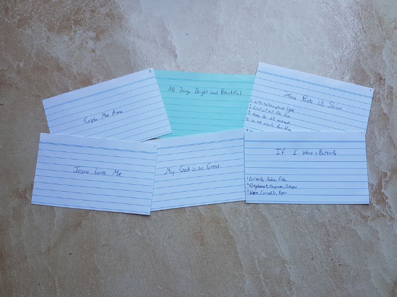 index cards with song titles