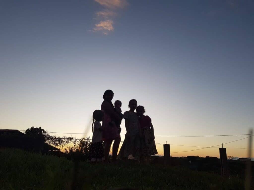 silhouette of 5 children